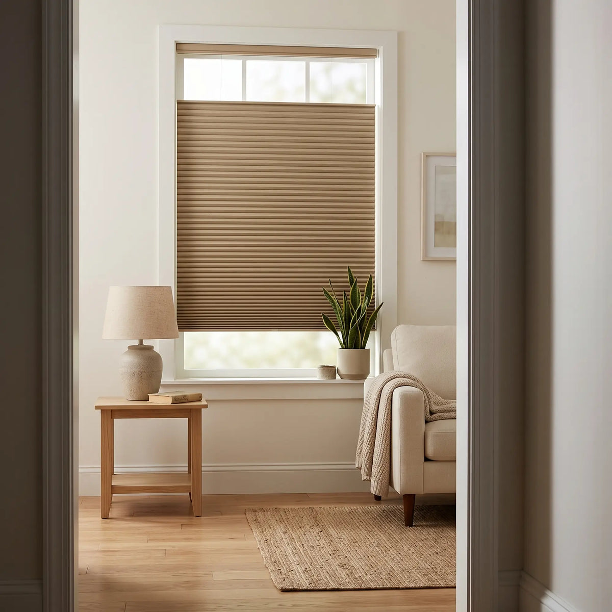 Brown Taupe Notch Signature Blackout Single Cellular Shade viewed through a hallway into a living room