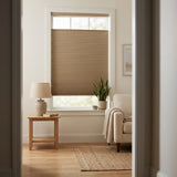 Brown Taupe Notch Signature Blackout Single Cellular Shade viewed through a hallway into a living room