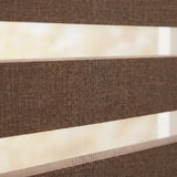 Transform your space with Zebra Room Darkening Roller Shades' earthy brown stripes, perfect for traditional or vintage settings.
