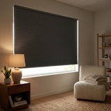 Interior view of a modern living space styled with Charcoal (Antharcite) 9 16 Inch Classic Single Cell Blackout Cordless Shades, delivering superior room-darkening performance.