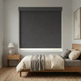 Charcoal dark grey Modern Fabric Blackout Roller Shades add a touch of elegance to this serene modern bedroom, blocking out light and promoting a restful ambiance.