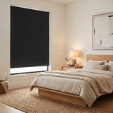 Reverse Roll Modern Fabric Blackout Roller Shades in charcoal add sophistication to this modern bedroom, blocking out light and ensuring a restful sleep.