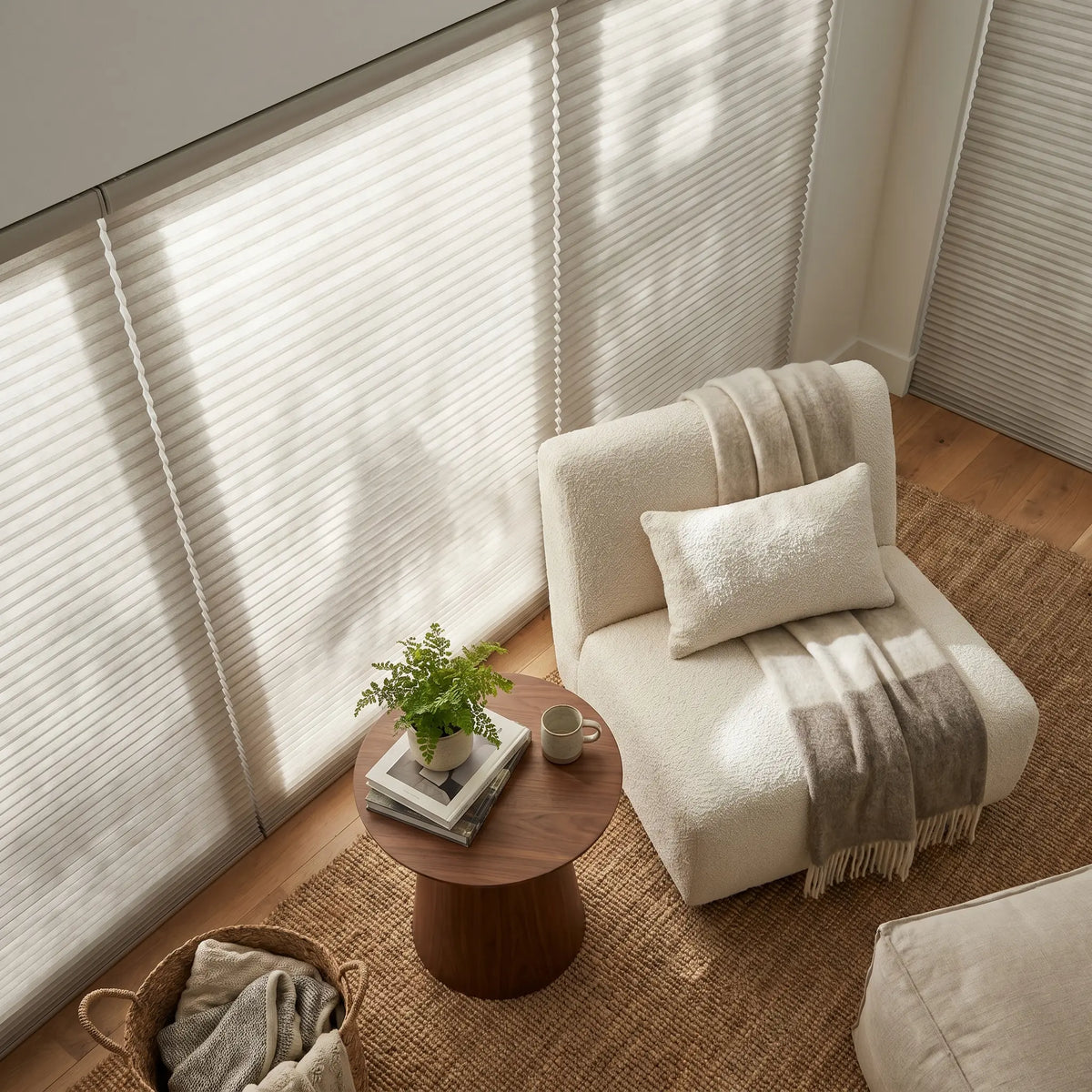 Showcasing Clean White 3 8 Inch Budget Single Cell Light Filtering Cordless Shades in a modern living space, casting a serene, filtered light across the room.