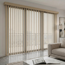 Load image into Gallery viewer, Custom window treatments: Cream (Compose Baguette) 3 1/2 Inch Signature Pvc Vertical Blinds shown in a inviting living space, providing durable, easy-to-clean window coverage.
