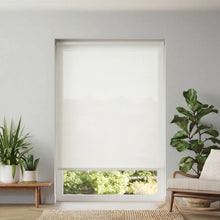 Load image into Gallery viewer, Softly filtered natural light through Cream Creme Signature light filtering shades in a contemporary dining area.
