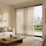 Styling a serene living space with Creamy (Cay Oatmeal) 3 1/2 Inch Signature Pvc Vertical Blinds, filtering incoming daylight effectively across wide glass surfaces.