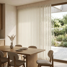 Load image into Gallery viewer, Showcasing Creamy (Light Beige) Classic Curved Pvc Smooth Vertical Blinds in a inviting living space, offering excellent light control and privacy for large spaces.

