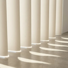Load image into Gallery viewer, Macro shot of S shape pvc vertical shades showing the elegant curve bending light.
