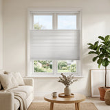 Simplistic Cordless Tdbu Pleated Shades effortlessly filter warm beige tones, while allowing adjustable privacy and versatile lighting in this inviting living space.