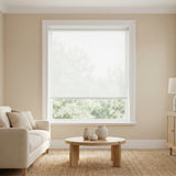 Contemporary Fabric Light Filtering Roller Shades in creamy white complement beige walls, creating a harmonious living space while filtering natural light
