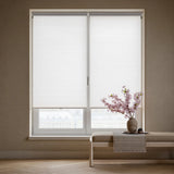 A modern living room featuring Creamy White (Cool White) 3 8 Inch Budget Single Cell Light Filtering Cordless Shades, reducing screen glare while welcoming natural sunshine.
