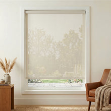 Load image into Gallery viewer, Premier 5% Solar Screen Roller Shade in creamy white provides warmth and comfort while blocking UV rays, perfect for a relaxing atmosphere.

