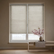 Load image into Gallery viewer, Styling a cozy living space with Creamy White (Greige) 3 8 Inch Budget Single Cell Light Filtering Cordless Shades, softening harsh rays while keeping the space bright.
