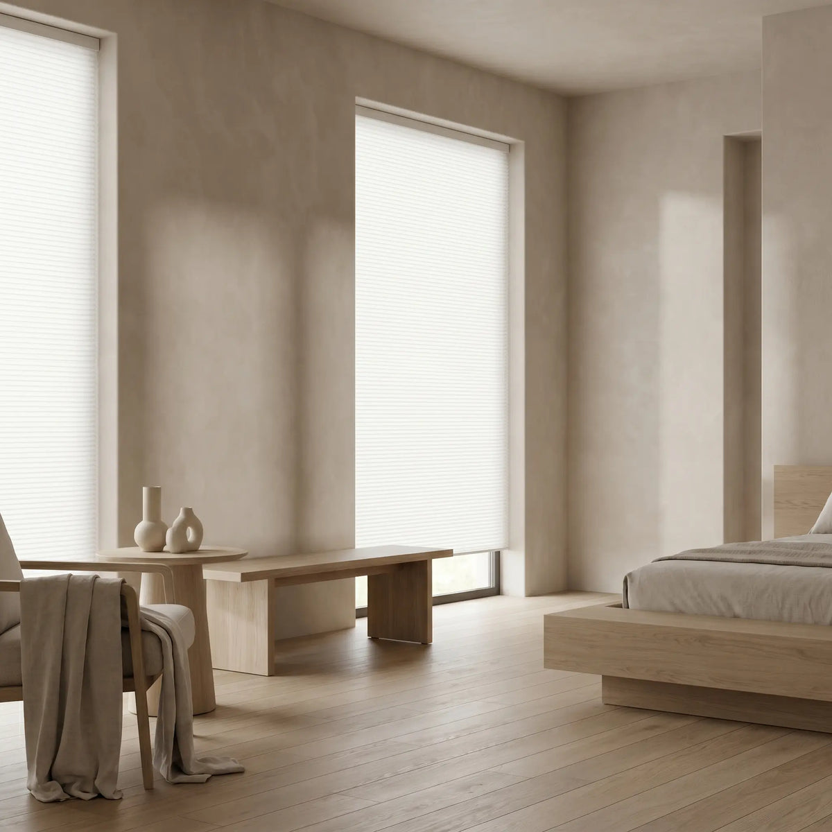 This modern bedroom is enhanced by  two Creamy White 9 16 Classic Single Cell Light Filtering Cordless Shades, casting a serene, filtered light across the room.
