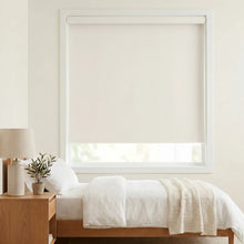 Load image into Gallery viewer, Classic Fabric Blackout Roller Shades complement creamy white walls in this serene bedroom, blocking out harsh light and promoting restful sleep.
