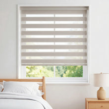 Load image into Gallery viewer, Add warmth and elegance with Zebra Solar Roller Shades in Creamy White, providing UV protection for your bedroom.

