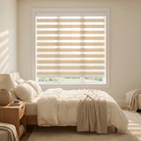 Zebra Light Filtering Roller Shades in creamy white beautifully complement this serene bedroom, allowing natural light to enter while maintaining a cozy ambiance.