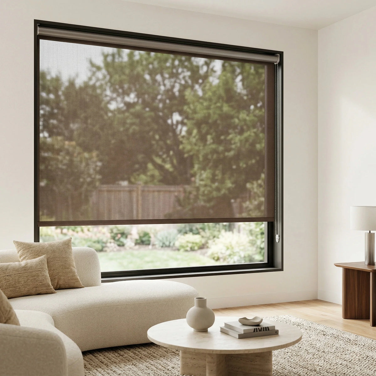 Contextual view of dark brown Chocolate solar roller shades with 14 percent openness, offering a clear view to the outdoors in a contemporary lounge.