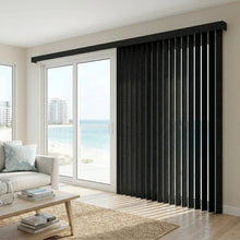 Load image into Gallery viewer, Deep Black (Ann Raven) 3 1/2 Inch Signature Pvc Vertical Blinds installed in a serene living space, offering excellent light control and privacy for large spaces.
