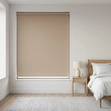 Economy Basic Vinyl Blackout Roller Shades in a modern room, creating a peaceful ambiance with their ability to block out external light and maintain a cozy atmosphere.
