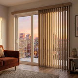 Natural sunlight hits the Earth Signature Pvc Vertical Blinds in this warm living space, ideal for expansive windows requiring versatile light management.