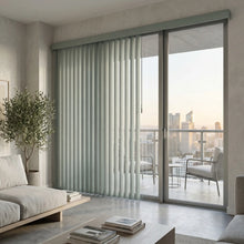 Load image into Gallery viewer, Natural sunlight hits the Emerald (Pagoda Shadow Grey) Signature Pvc Vertical Blinds in this modern living space, offering excellent light control and privacy for large spaces.

