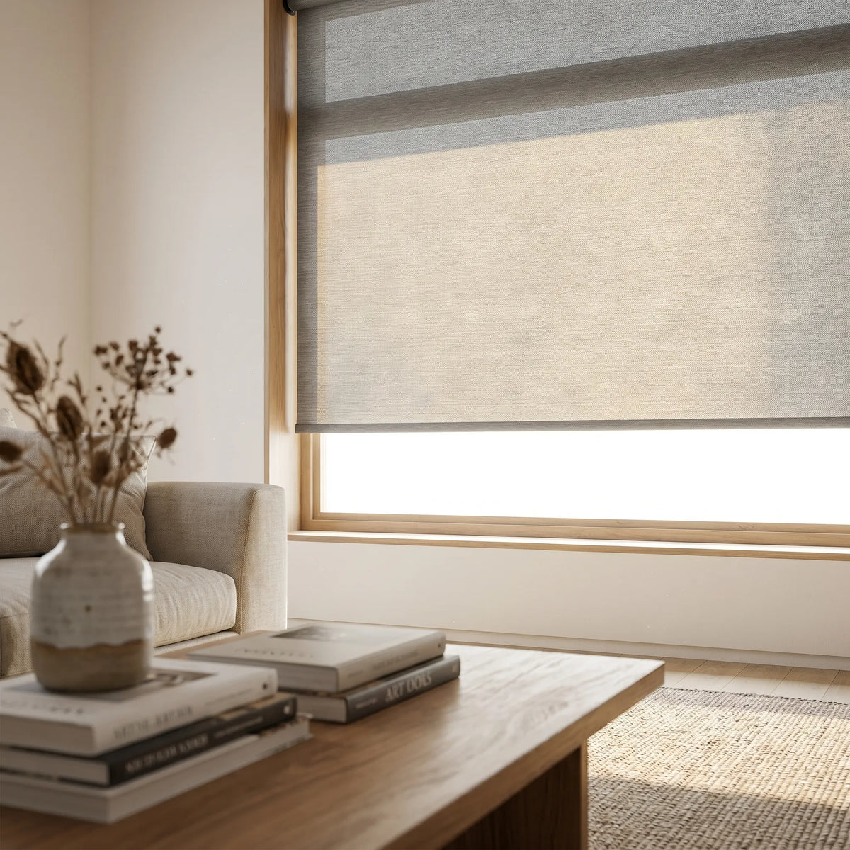 Classic Fabric Light Filtering Roller Shades in gray bring a calming atmosphere and effortless elegance to this cozy living room.
