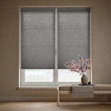 Load image into Gallery viewer, Styling a serene living space with Gray (Pewter) 3 8 Inch Budget Single Cell Light Filtering Cordless Shades, providing excellent UV protection and a soft ambient light.
