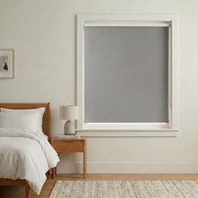 Load image into Gallery viewer, View of a cozy study with Maroon (Garnet Red) Classic Cordless 6g Aluminum Mini Blinds, delivering durable privacy with a modern metallic profile.
