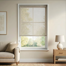 Load image into Gallery viewer, Modern Light Sandstone Grey Signature solar roller shades featuring 3% openness, styled in a contemporary living room with a cream sofa and warm wooden accents for a balanced, airy feel.
