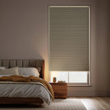 Custom window treatments: Light Brown 9 16 Inch Classic Single Cell Blackout Cordless Shades shown in a modern bedroom, perfect for dimming the room completely.