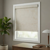 Light gray Jerusalem Silver Luxe room darkening shades in a minimalist bedroom setting, filtering external light for comfort.