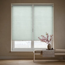 Load image into Gallery viewer, Elegant Light Green (Sea Salt) 3 8 Inch Budget Single Cell Light Filtering Cordless Shades complementing a modern retreat, gently filtering daylight to create a warm glow.
