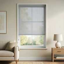 Load image into Gallery viewer, Modern Light Grey Signature solar roller shades featuring 3% openness, styled in a contemporary living room with a cream sofa and warm wooden accents for a balanced, airy feel.
