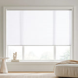 This modern living space is enhanced by Neutral 7 16 Inch Double Cell Light Filtering Shades, allowing bright, diffused daylight to fill the interior.