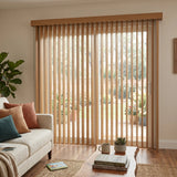 Warm and inviting, Wood Grain Faux Wood PVC Vertical Blinds harmonize with orange accents in this stylish room, effortlessly filtering sunlight while maintaining a bright atmosphere.