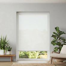 Load image into Gallery viewer, Clean Off White Oyster Signature light filtering roller shades adding a sophisticated, modern look to a residential window.
