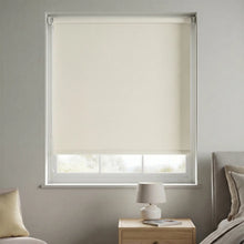 Load image into Gallery viewer, The clean lines of a Spun White Signature blackout roller shade, designed for maximum functionality and style.

