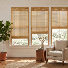 Load image into Gallery viewer, Almond Natural Bamboo Shades in tan on living room windows beside a fiddle leaf fig
