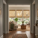 Cookie Natural Bamboo Shades framing a bright living room viewed from the hallway