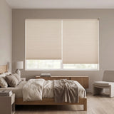 Tan French-Pastry Signature Blackout Double Cellular Shade on a bedroom window beside a wood nightstand