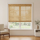 Hazelnut Natural Bamboo Shade on a living room window beside a wood accent chair