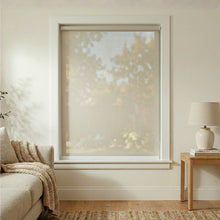 Load image into Gallery viewer, Functional Tan Sandstone Signature solar shades reducing sun glare while preserving the outdoor view in a modern home.
