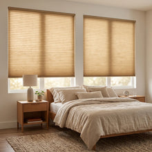 Load image into Gallery viewer, Simplistic Cordless Pleated Shades in Terra Brown filter gentle sunlight, harmonizing with a serene garden view and calming beige decor in this peaceful bedroom sanctuary.
