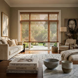 Hardwood Cordless Horizontal Blinds expertly filter sunlight in this inviting living room, where beige sofas and white armchairs converge under soft, gentle illumination.