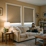 A warm living space featuring Warm Brown 1 2 Inch Budget Single Cell Blackout Cordless Shades, perfect for dimming the room completely.