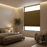 Warm Brown 1 2 Inch Budget Single Cell Blackout Cordless Top Downbottom Up Shades installed in a modern bedroom, keeping the room dark while offering dynamic lighting options.