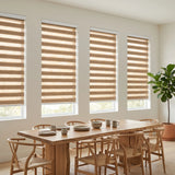 Zebra Light Filtering Roller Shades add warm, earthy tones to modern dining rooms like this one, allowing natural light while maintaining ambiance with its soft, brown hue.
