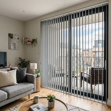 Load image into Gallery viewer, Showcasing White Classic Curved Pvc Smooth Vertical Blinds in a serene living space, delivering sleek functionality and room-darkening capabilities.
