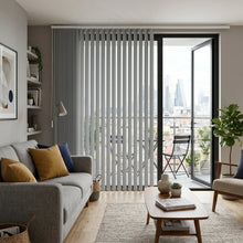 Load image into Gallery viewer, White Gray Classic Curved Pvc Smooth Vertical Blinds installed in a serene living room, combining practical light filtering with a structured modern look.
